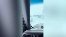 Video shows truck overturned after 100-car pile up in Michigan