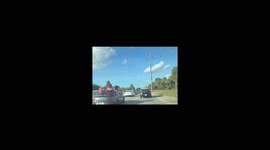 Girl Flies Out of Sunroof