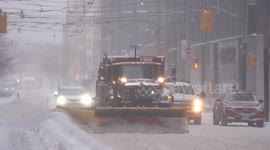 Snowstorm blankets Toronto streets and public spaces