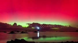 France: Northern Lights Paint The Sky Above Ile Vierge Lighthouse In Brittany