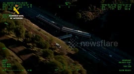 Drone footage reveals wreckage after high-speed train crash in Spain
