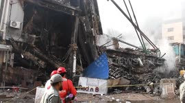 Death toll climbs to 14 in Pakistan shopping center fire, dozens missing