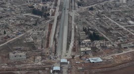 DRONE - Syrian Army units enter Aleppo's Deir Hafir after YPG/SDF withdrawal