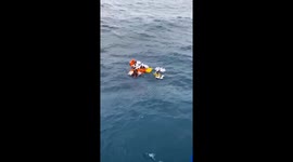 Crew rescued from cargo ship that began sinking in Indonesia