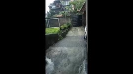 Home floods during sudden downpour in Bali