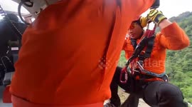 Helicopter search teams continue to recover bodies from Indonesia plane crash site