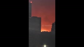 Chile wildfire turns sky into eerie red haze