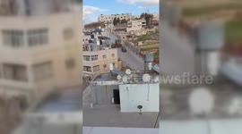 Palestine: Israeli Military Bulldozer Slips During Hebron Raid