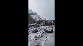Friends Slip In Sync On Icy Path