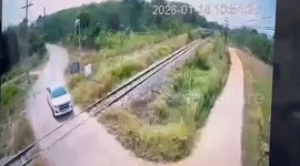 Train crashes into pickup truck on level crossing leaving one dead