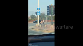 China: Runaway battery sparks electric scooter fire at intersection