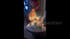 China: Chinese girl accidentally sprays saliva like spider silk while blowing out birthday candles
