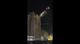 Fireworks launched from high-rise building in Jiangsu, China