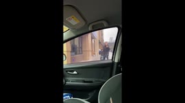 Man slips and falls while approaching a car in Shandong, China