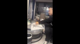 Chinese man turns making popcorn at home into a fun moment