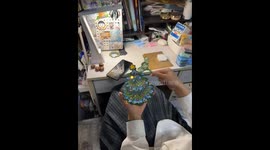 Magic wand lights up pixel art Christmas tree through magnets in China