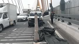 Heavy steel load slides through truck windshield after sudden braking on Thailand bridge