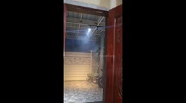 Strong winds and heavy rain hit home terrace in Sidoarjo Taman, Indonesia