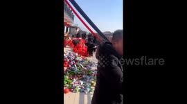 China: Chinese new home celebration sees candy and snacks thrown from rooftop