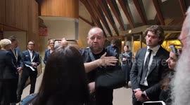 Syrian man who likely saved countless lives gets hero’s reception at Bondi terrorist attack national day of mourning event in Sydney, Australia