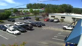 Light aircraft crashed into building killing pilot due to 'faulty control stick pushrod'