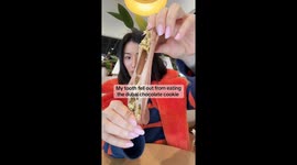 Content creator ‘yummylouey’ loses tooth to Dubai chocolate in viral 2‑million‑view clip