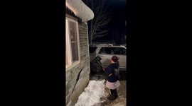 Grandma Knocking Snow Down or Snow Knocking Down Grandma