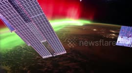 US: Cosmonaut Flies Through Stunning Red And Green Northern Lights
