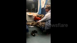 Gross! Man Uses Train Tray Table and Seat Cover for Personal Pedicure