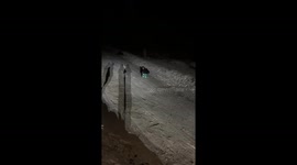 Nighttime snowy hill mishap in Simferopol, Russia