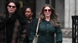 UNCAPTIONED: Elizabeth Hurley weeps in court over phone tapping claims