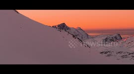 Greenland: Pink sunset in Greenlandic landscape