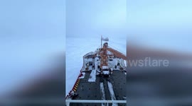 US: Ice-Trapped Freighter Freed By Cutter Mackinaw On Lake Huron