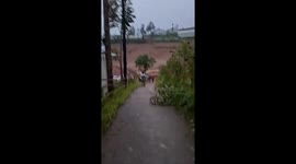 Indonesia landslide buries homes with more than 100 residents feared dead