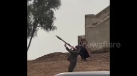 Syria: A young man launching an 