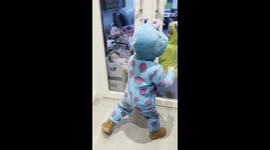 The video shows my 2½-year-old twin toddlers, Remy and Summer, playing a game of trick-or-treat at home.