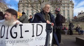 Part 2 of Piers Corbyn's famous phrase 'Resist defy do not comply' protested against Digital ID in London, UK