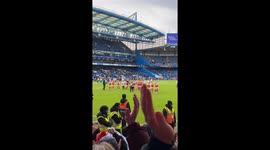 Emotional footage of Arsenal fans chanting for Katie McCabe during the Chelsea vs Arsenal Women's match. The video shows the Arsenal star appearing to wipe away tears twice as she acknowledges the traveling support during the London derby. This fan-captur