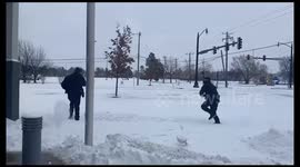 Warr Acres Rookies Take Brief Break for Snowball Fun