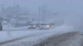 Heavy snowfall causes vehicle spin on Brooks Avenue near Rochester airport, United States
