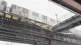 Video shows: white out conditions, person jogging, street sign, NYPD, snow plows, public transportation, vehicle vehicles, parks,