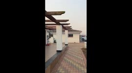 helicopter pilot saves entire home from a raging fire in spectaculat fashion