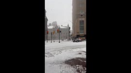 Snowy City Hall Turns Into Playful Scene as Mini-Buggy Spins Through Philadelphia