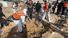 Bodies of Palestinians killed in Israeli attacks exhumed from Gaza mass grave