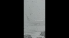 Blizzard buries JFK airport as major winter storm paralyses travel