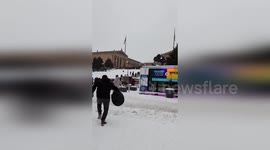 US: Snowstorm Turns Philadelphia’s Rocky Steps Into A Citywide Sledding Playground