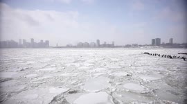 Ice floating on Hudson river as temperature continue to be below freezing point 2