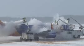 Southwest Airlines jet undergoes deicing amid winter storm in Rochester, New York, USA