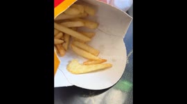 Fries arranged as Nike logo on McDonald’s burger in Bailleul, France