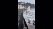 Storm Chandra: Huge waves crash over seawall and over passing trains in Devon
